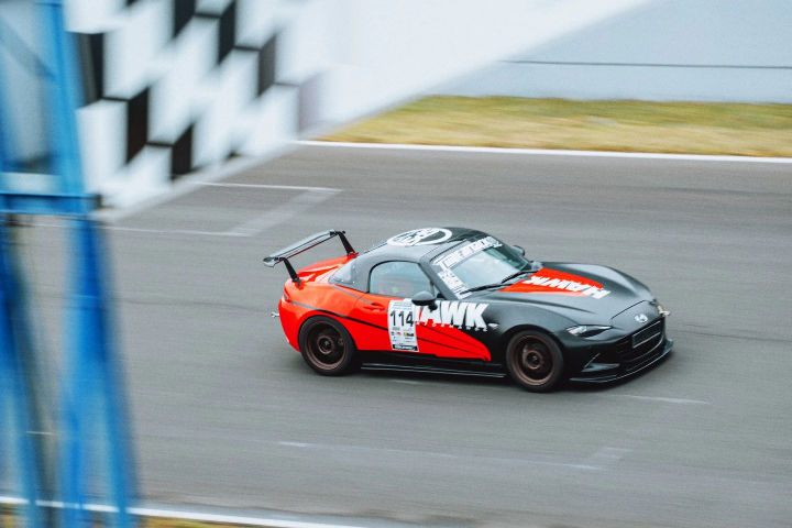 Nissan Silvia S15 drift car with an oversized rear wing