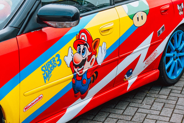 Super Mario-themed car wrap — colourful door detail